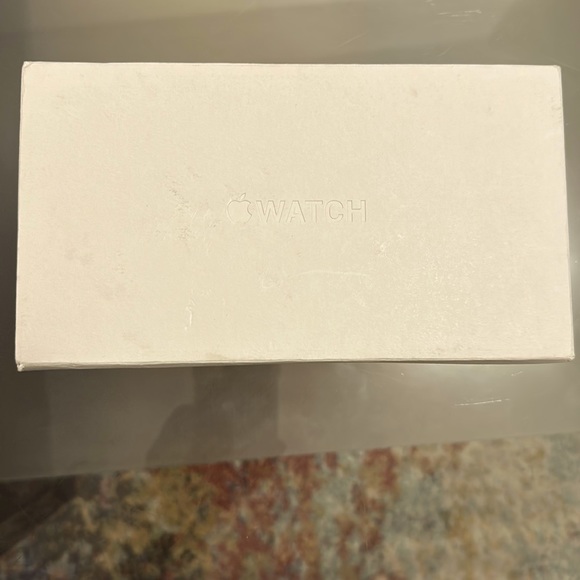 Apple Watch, band, and USB-C charging cable. Including cellular capability